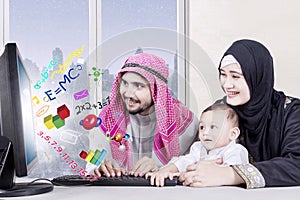 Parents teaching math to child