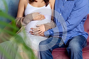 Parents-to-be expecting a baby. Unrecognizable caucasian couple.