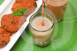 Indian fried snack, Parippu vada with milk tea or Chai, Kerala photo