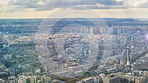 Paris from above, divine summer sunshine illuminating city buildings, timelapse