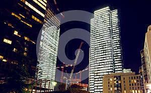 Paris city at night with business buildings