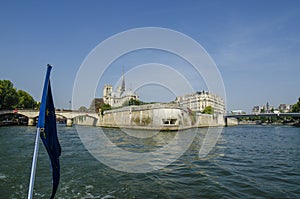 Paris city view with Notre Dame Cathedral over river Seine.