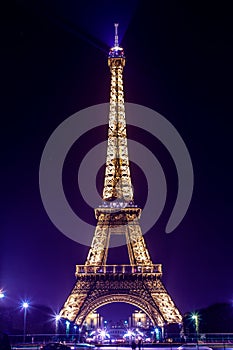 Paris Eiffel Tower by night. Purple light