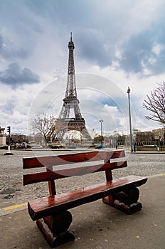 Paris, empty bench with Eiffel tower in the background