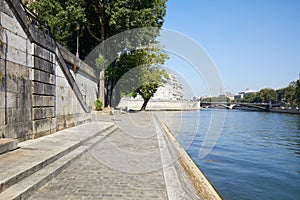 Paris, empty Seine river docks wide angle view in a sunny day