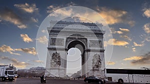 PARIS, FRANCE - APRIL-19-2020 :The front view of Triumphal Arch de l Etoile. The monument was designed by Jean Chalgrin in 1806 in