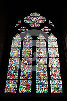 Paris, France - April 1, 2019: Stained glass window inside the Notre Dame Cathedral, Paris, France