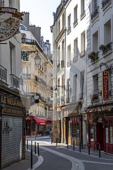 Typical haussmann buildings and restaurant in latin district in Paris