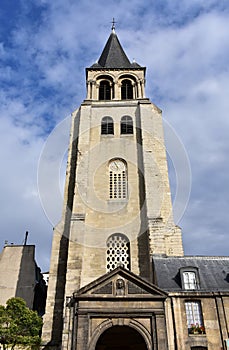 Church of Saint Germain des Pres, facade and bell tower from Place Sartre-Beauvoir. Paris, France. photo