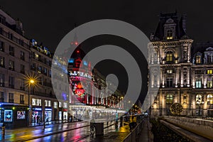 Night view of the landmark Bazar de l'Hotel de Ville (BHV) Marais department store on Rue de Rivoli in Paris