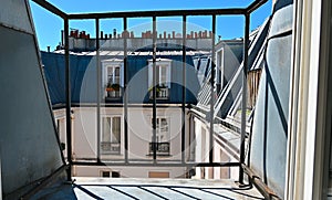 Paris, France. Escape from domestic life: POV shot towards the attic window.