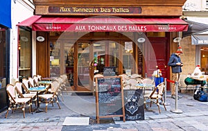 A traditional French bistro Aux tonneaux des Halles at Montorgueil street in Paris, France.