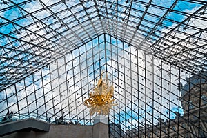 Paris, France - 17.01.2019: Interior of the Louvre Pyramid,  The pyramid structure was engineered by Nicolet Chartrand Knoll and