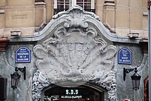 Detail of the facade of a building in Art Nouveau Style on the boulevard Madeleine in Paris