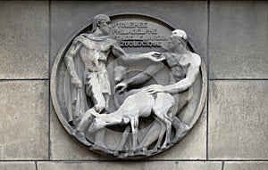 Ptolemy Philadelphe founds the zoo. Stone relief at the building of the Faculte de Medicine Paris photo