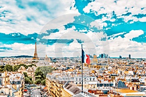 PARIS, FRANCE - JULY 05, 2016 : Beautiful panoramic view of Paris from the roof of the Pantheon. View of the Eiffel Tower and flag