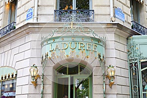 Laduree famous confectionery store entrance in Champs Elysees in Paris, France