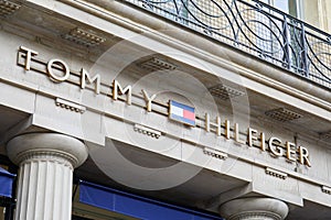 Tommy Hilfiger fashion luxury store sign in Paris, France