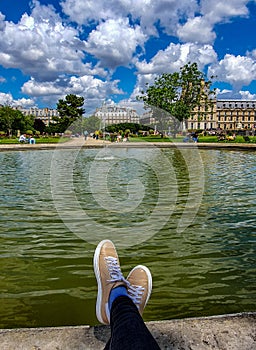 Paris, France, June 2019: Relaxing in the Tuileries Garden