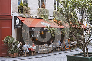 Paris, France - June 25, 2022: Cafe with a terrace in Paris.