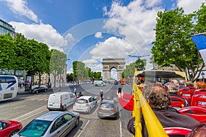 Paris, France - June 1, 2015: Great view from city tour bus driving through Champs Elysee Avenue