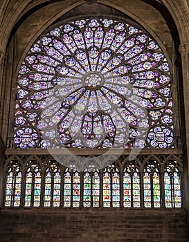 Paris, France - March 13, 2018: Stained glass window in Notre dame cathedral.  North Rose window at Notre Dame cathedral dates