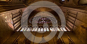 Paris, France, March 27, 2017: Stained glass window at Notre Dame cathedral. Notre Dame church is one of the top tourist