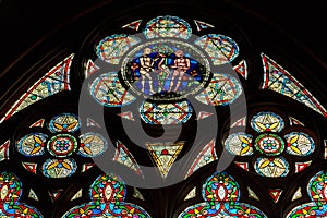 Paris, France, March 27, 2017: Stained glass window at Notre Dame cathedral. Notre Dame church is one of the top tourist