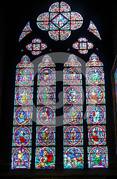 Paris, France, March 27, 2017: Stained glass window at Notre Dame cathedral. Notre Dame church is one of the top tourist