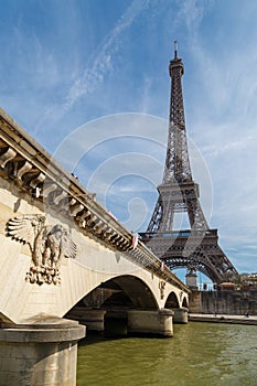 Paris, France, March 30, 2017: Tour Eiffel Eiffel Tower, river Seine at sunset. Eiffel Tower, named after engineer