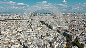 PARIS, FRANCE - MAY 30, 2023: Panorama aerial view of Paris city historical center. Top drone view of old and modern