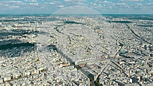 PARIS, FRANCE - MAY 30, 2023: Panorama aerial view of Paris city historical center. Top drone view of old and modern