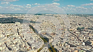 PARIS, FRANCE - MAY 30, 2023: Panorama aerial view of Paris city historical center. Top drone view of old and modern