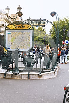 PARIS, FRANCE, MAY 20, 2013 - Entrance to the Paris metro at Blanche station. The Paris metro or metro is a fast transit system in