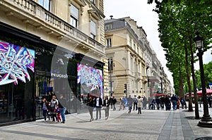 Paris, France - May 14, 2015: Local and tourists on the Avenue des Champs-elysees