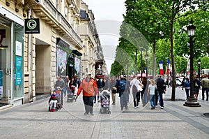 Paris, France - May 14, 2015: Local and tourists on Champs-elysees