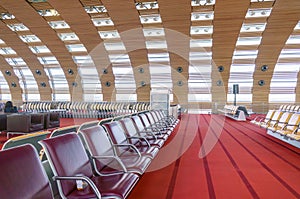 Paris, France - 1 April, 2017: Unidentified people at the hall of departure in the terminal of Roissy Charles de Gaulle