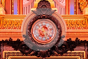 Paris, France - November 14, 2019: Clock in the Opera National de Paris Garnier large foyer.