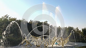 PARIS, FRANCE - OCTOBER, 15, 2017: close up of the beautiful dances fountain at versailles in paris