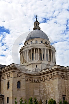 Paris, France, The Pantheon, Latin Quarter. Walls and dome. Windows, handrail and columns. Cloudy sky.