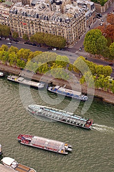 Cruise ship or boat for tourists on Seine River. aerial view from Eiffel Tower. Paris