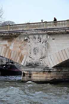 Paris, France 03.25.2017: Stone bridges over the river Seine in Paris