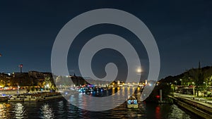 Paris, France - Timelapse - Colorful Full Moonrise at Night Over Paris Center Seine River and Bridges Docks Traffic