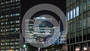 Paris, France - Timelapse - Differents Perspectives at La Defense Business District at Night Lights Clouds