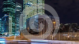 Paris, France - Timelapse - Pedestrian View of La Defense Business District at Night With Road Traffic Buildings