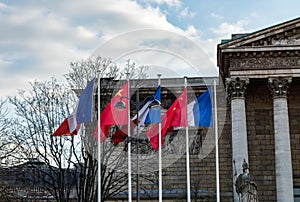 Paris: French and Chinese flags in the wind in front of National photo