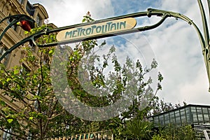 Paris metro entrance sign