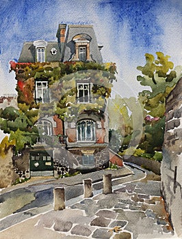 Paris Montmartre street with old house with ivy walls in autumn