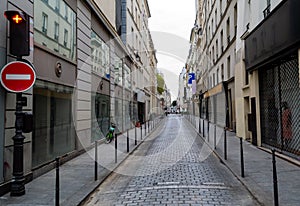 Paris narrow street stretching to the horizon. Beautiful facades of houses