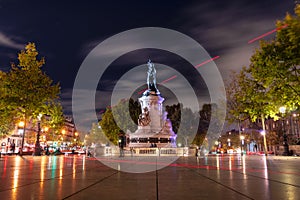 Paris at night Statue of Republique at Place de la Republique France photo